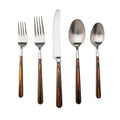 Five-piece stainless steel flatware set with tortoiseshell-patterned handles including two forks, knife, and two spoons.