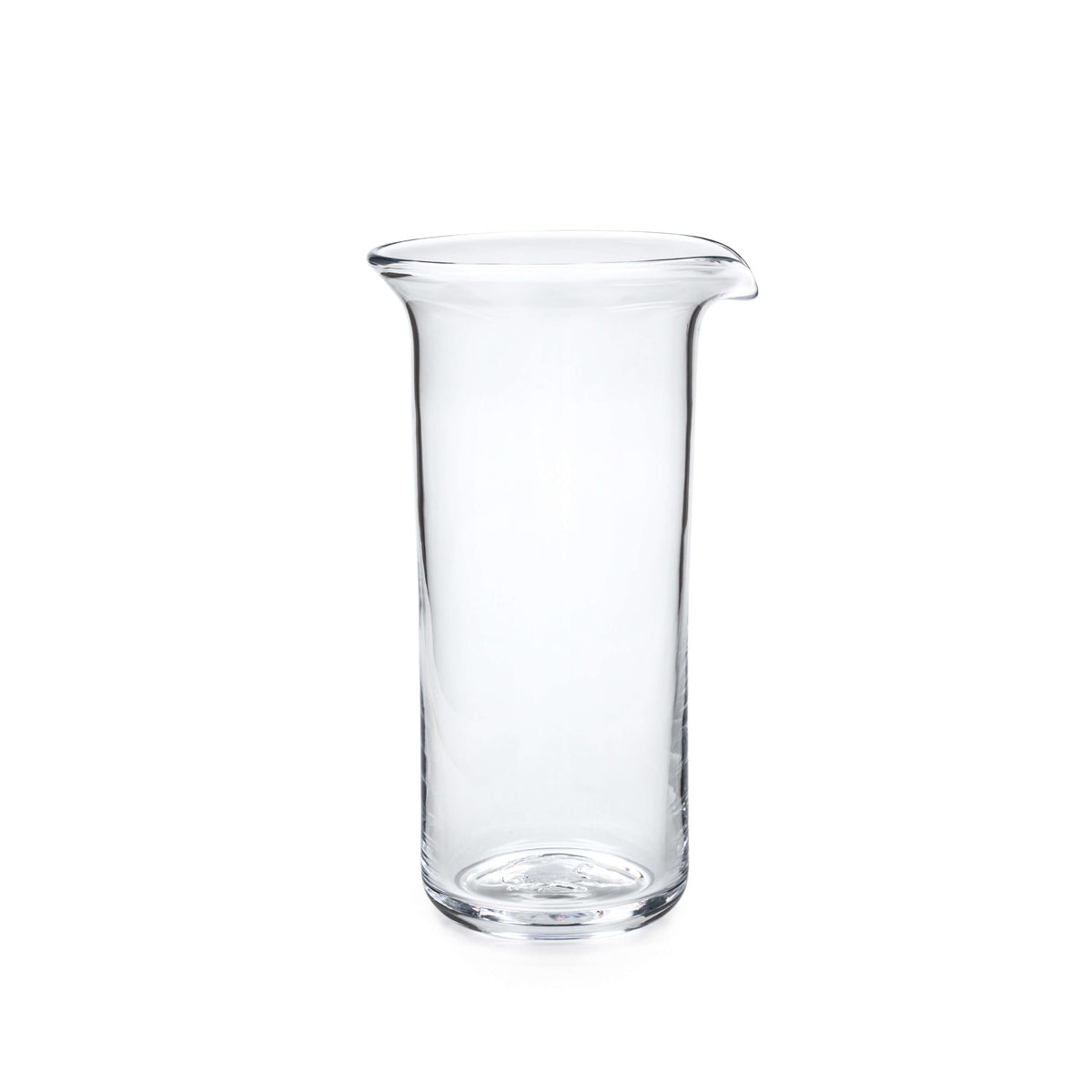 Clear glass pitcher with straight sides, pouring spout, and rounded rim.