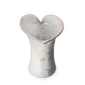 Clear glass vase with heart-shaped opening and calla lily relief pattern throughout the cylindrical body.