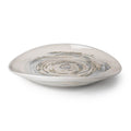 Shallow white ceramic platter with gray spiral pattern and curved edges.