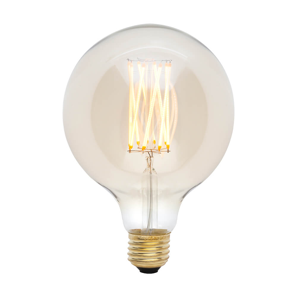 Clear globe LED bulb with warm-toned glowing filaments and brass base.