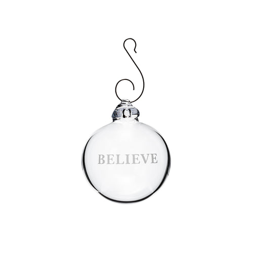 Clear glass round ornament with "BELIEVE" engraved on front and metal hook at top.