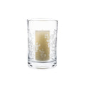 Clear glass hurricane with white berry branch engravings holding a cream-colored pillar candle.