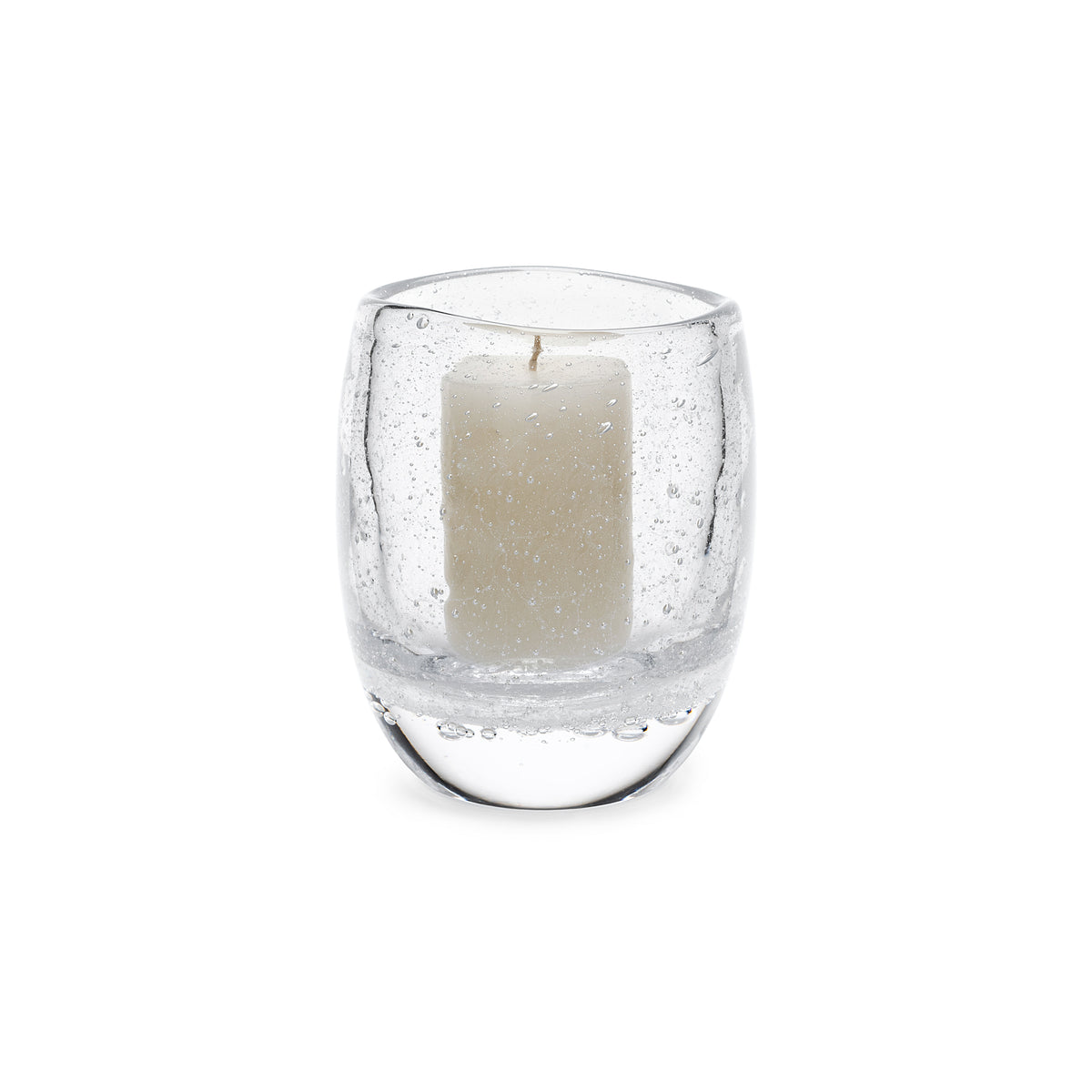 Clear glass hurricane with cream pillar candle inside and speckled glass texture.