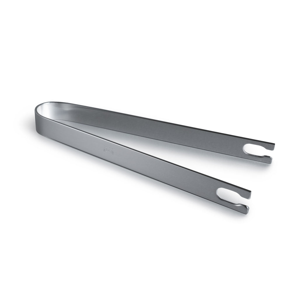 Stainless steel ice tongs with two hinged arms and grip handles on white background.