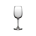 Empty wine glass with clear bowl, thin stem, and round base on white background.