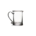 Clear glass tankard with curved handle and rounded rim.