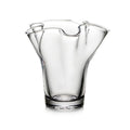 Clear glass vase with fluted sides and wavy rim opening.