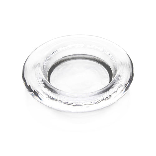 Clear glass round coaster with textured rim and shallow center well.