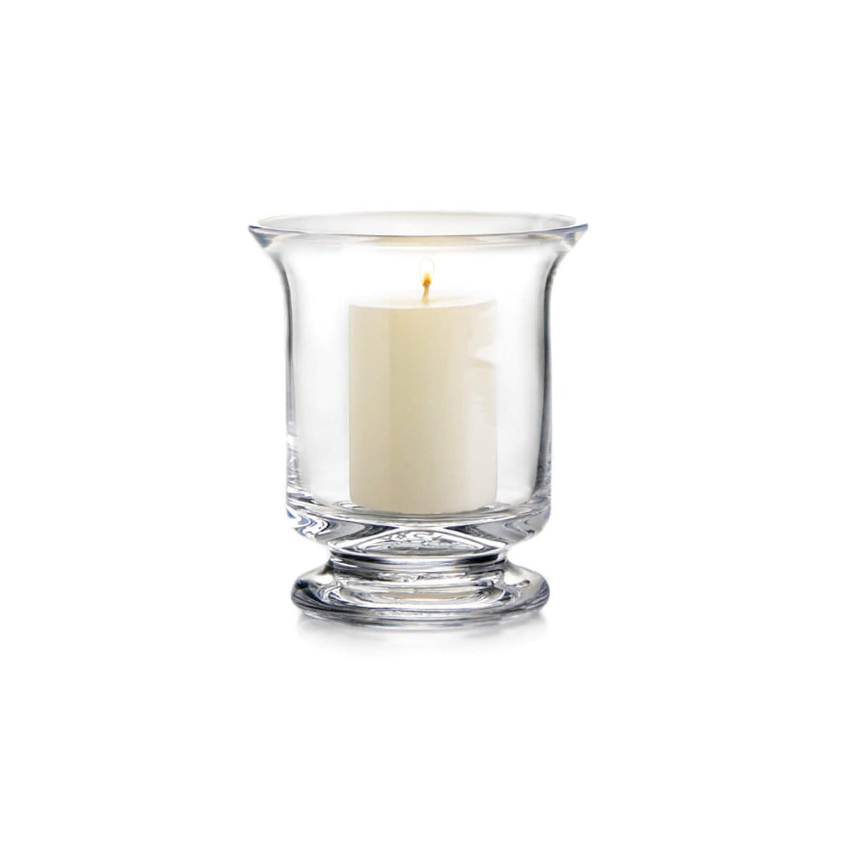 Clear glass hurricane candle holder with cream colored pillar candle inside.