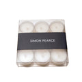 Nine white tealights in clear plastic cups arranged in a clear box with black Simon Pearce band.