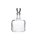 Clear glass decanter with a narrow neck, wide rounded body, and a rounded glass stopper.