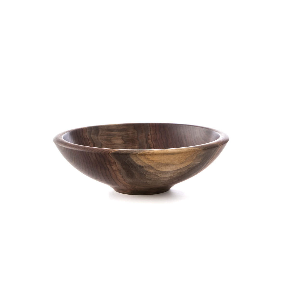 Dark brown wooden bowl with curved sides and natural grain patterns visible throughout.