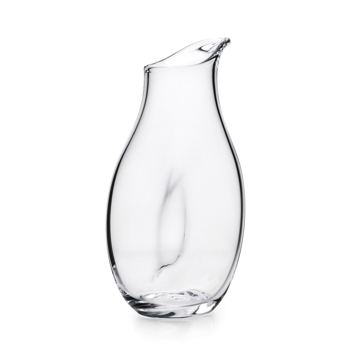 Clear glass carafe with curved body and angled pouring spout, featuring a twisted handle.