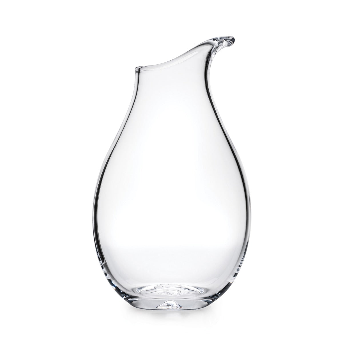 Clear glass carafe with curved teardrop shape and angled pouring spout.