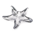 Silver and white starfish-shaped dish with five pointed arms and textured surface detail.