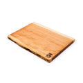 Cherry wood cutting board with natural live edges on two sides and brand logo on corner.