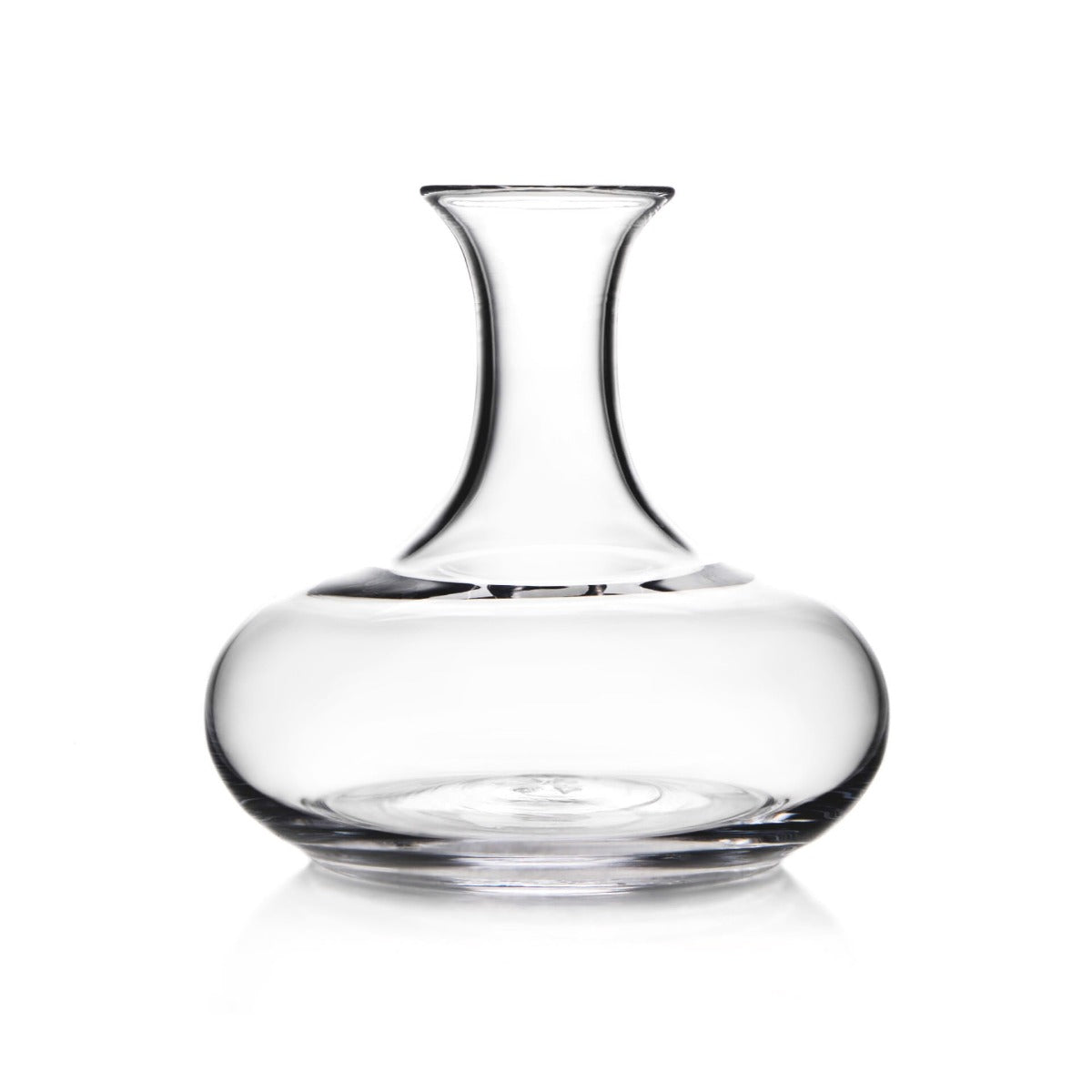 Clear glass wine decanter with wide rounded base and tapered neck on white background.