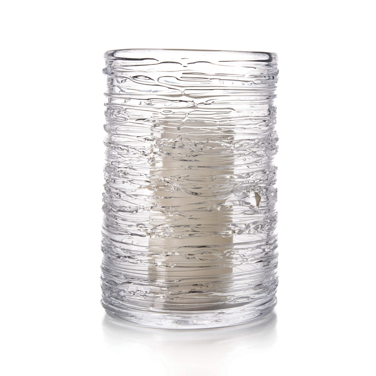 Clear glass tumbler with horizontal textured ridges and swirled pattern throughout the cylindrical body.