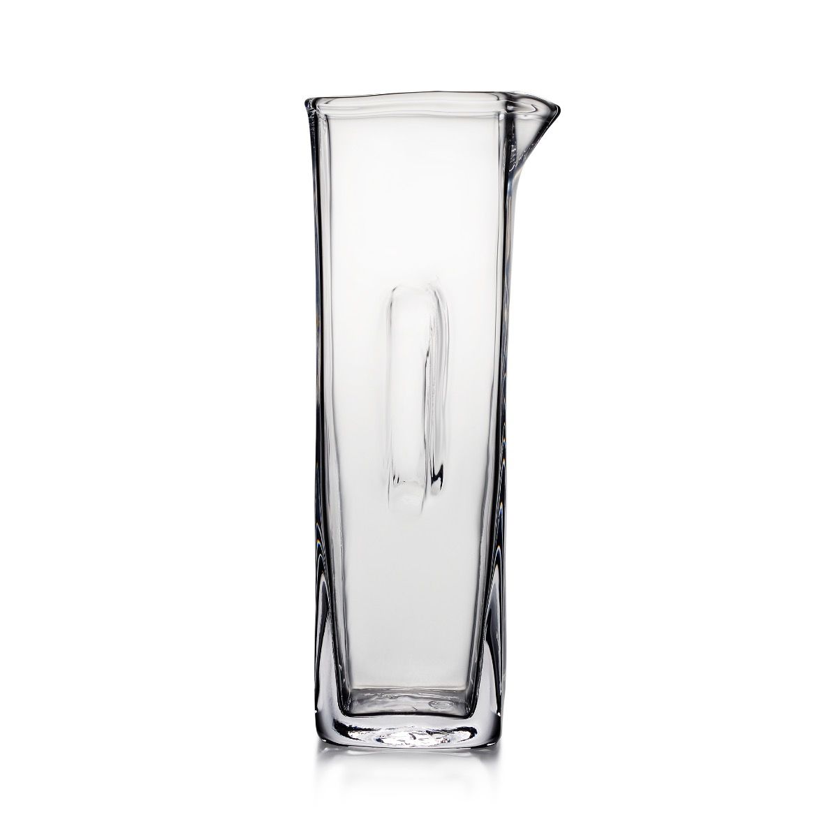 Clear glass cocktail carafe with a pouring spout and tall cylindrical shape.