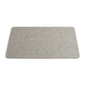 Grey rectangular felt placemat with rounded corners and textured surface.