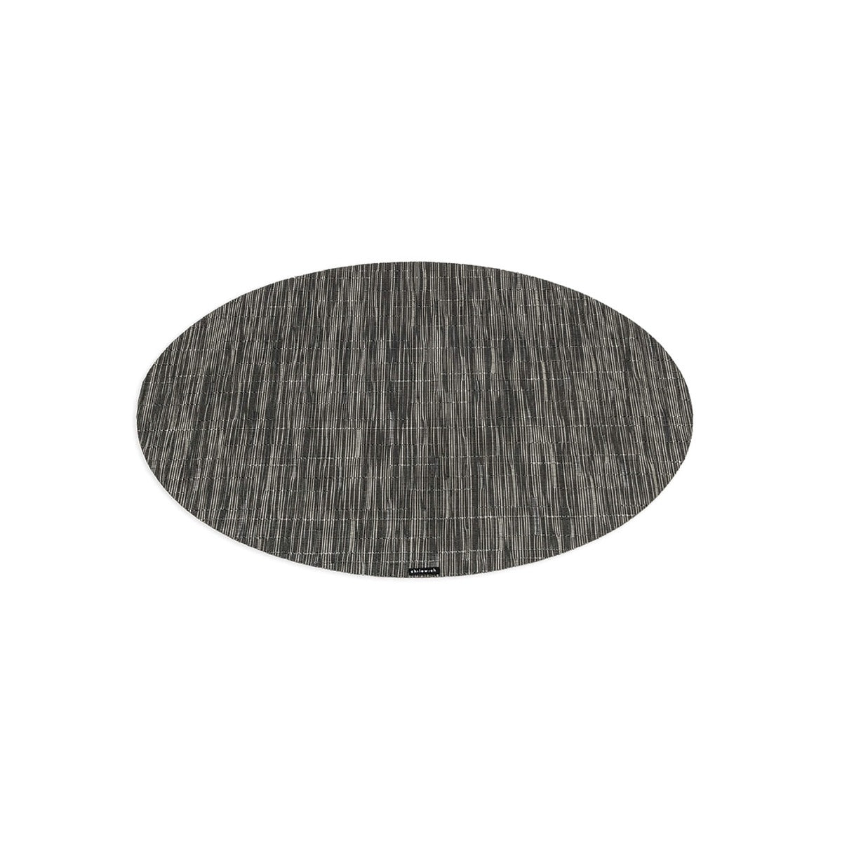 Grey oval placemat with bamboo texture and vertical line pattern.