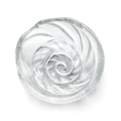 Small white bowl with spiral shell relief pattern molded into the interior surface.