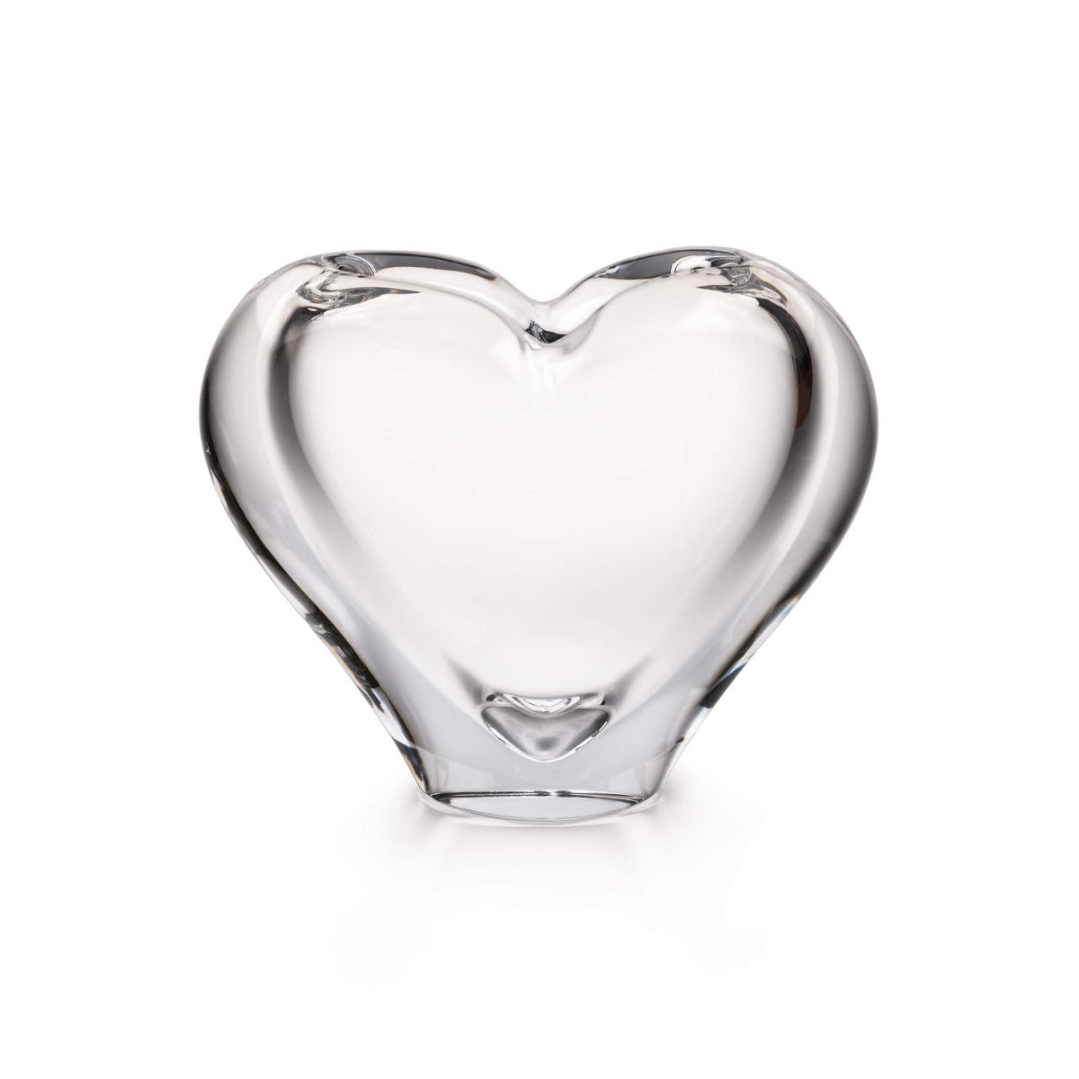 Clear glass vase shaped like a heart with a wide base and narrow opening at top.
