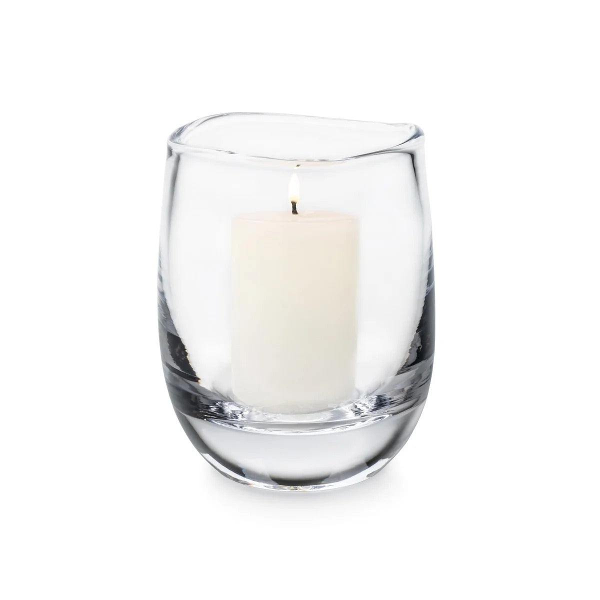 Clear glass hurricane vase containing a cream-colored pillar candle with single wick.