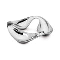 White and silver polished metal serving bowl with three curved compartments and handles.