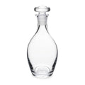 Clear glass decanter with rounded body, narrow neck, and matching glass stopper with flat top.
