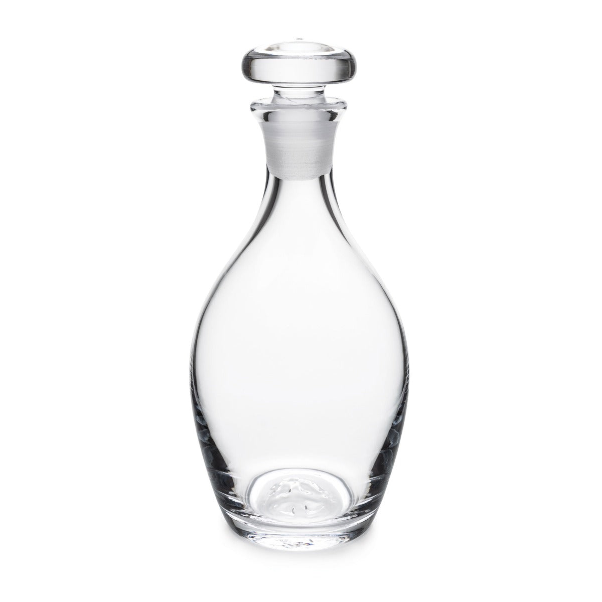 Clear glass decanter with rounded body, narrow neck, and matching glass stopper with flat top.