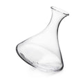 Clear glass wine decanter with curved body and angled spout, tilted at an angle.
