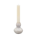 White crystalline candlestick holder with bulbous base and cylindrical socket holding a cream taper candle.