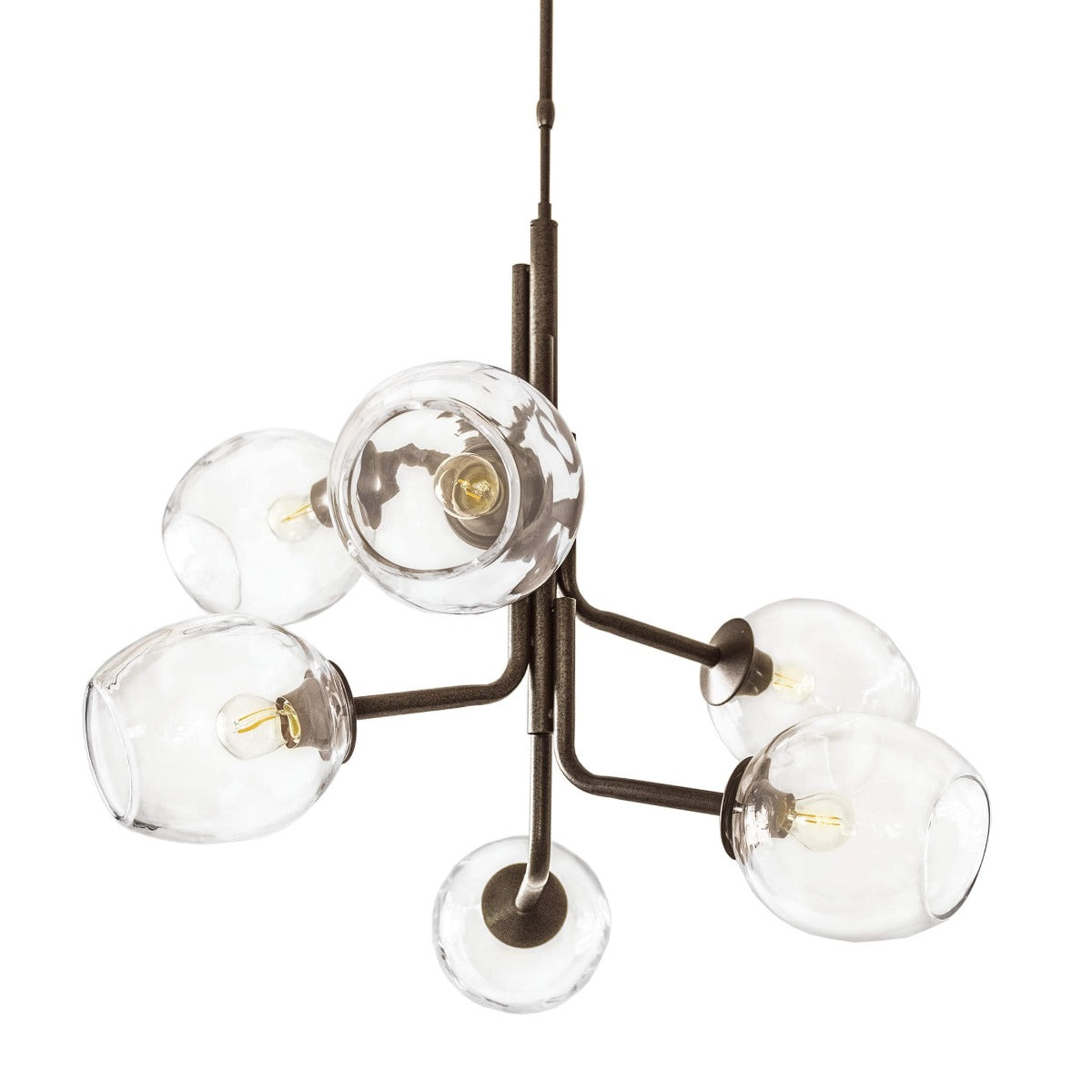 Bronze chandelier with six clear glass globe shades and brass-tipped bulb holders suspended from matching metal arms.