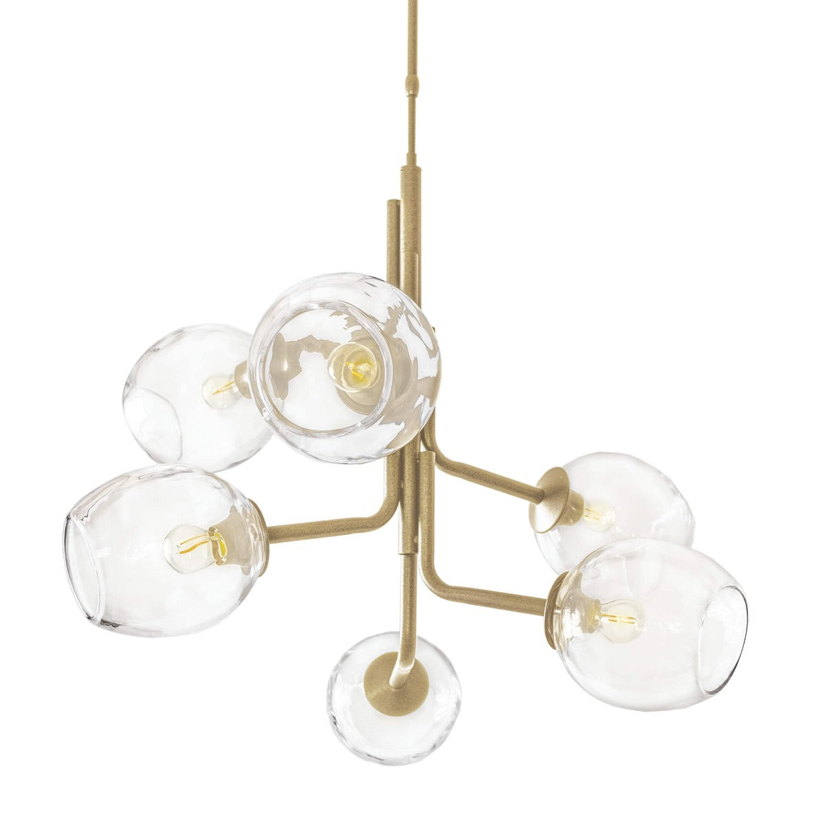 Brass chandelier with six clear glass globe shades and exposed bulbs suspended from curved arms.