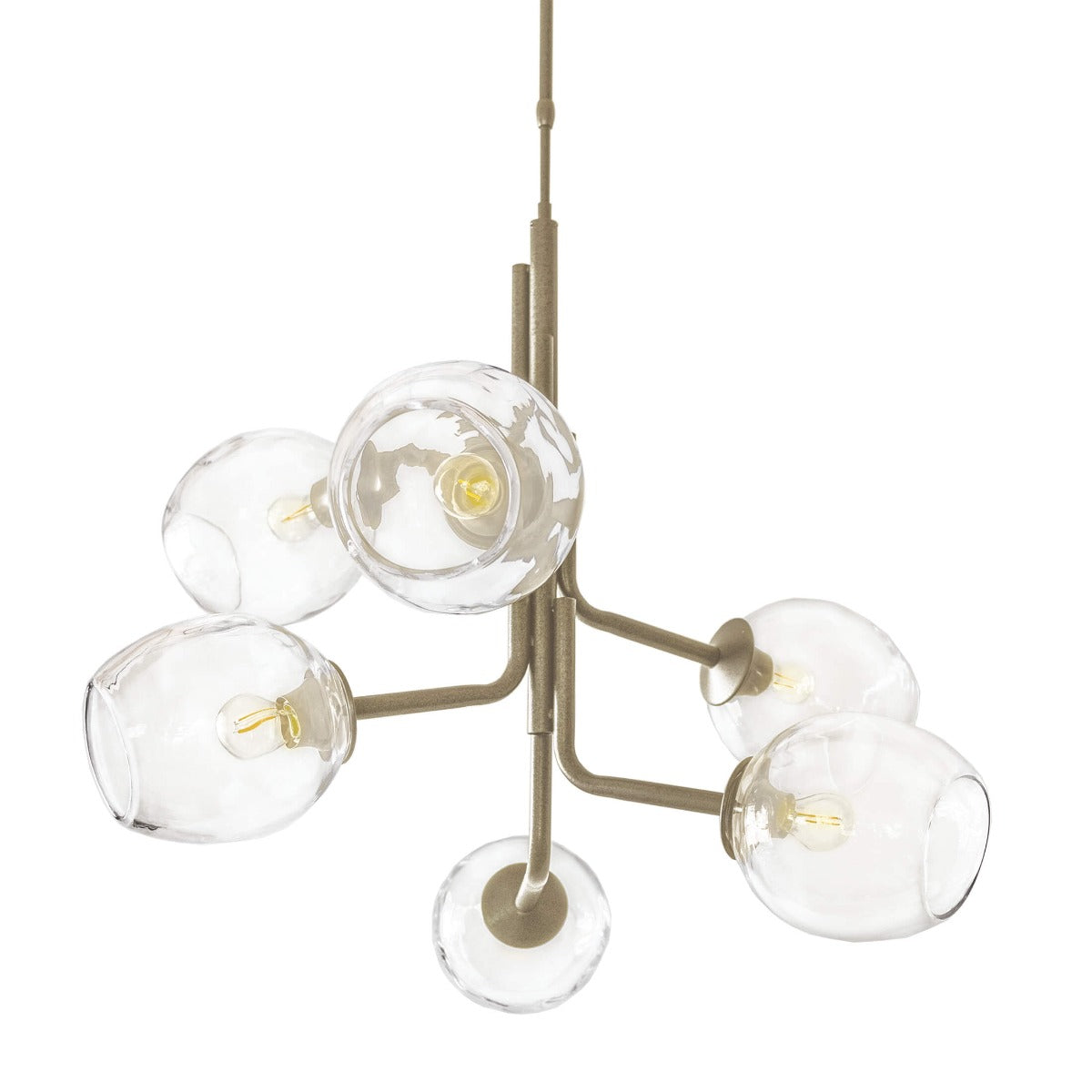 Brass chandelier with six clear glass globe shades and exposed filament bulbs arranged in a branching pattern.