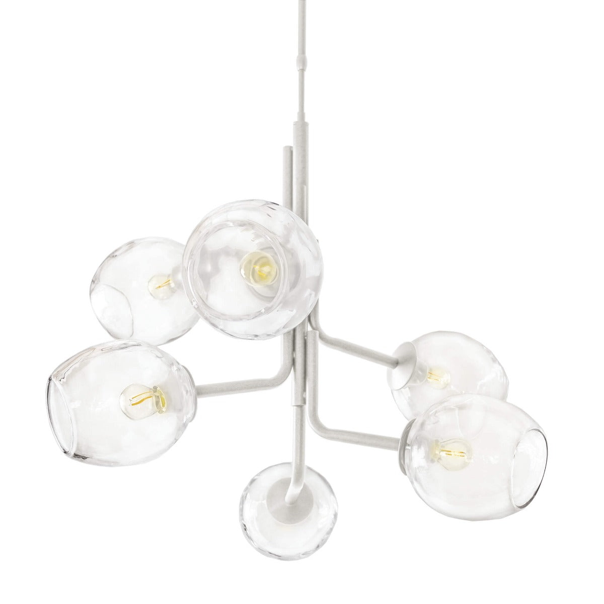 White metal chandelier with six clear glass globe shades and brass filament bulbs.