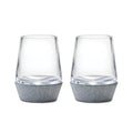 Two clear whiskey glasses with gray felt bases.