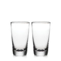 Two clear pint glasses with thick bases side by side.