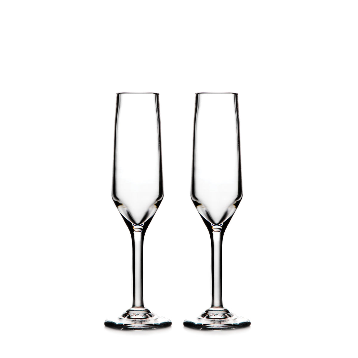 Two clear glass champagne flutes with tapered bowls and thin stems on white background.