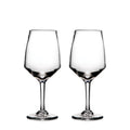 Two clear wine glasses with tapered bowls and stems on a white background.