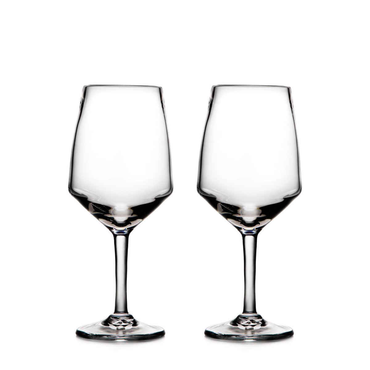 Two clear wine glasses with tapered bowls and stems on a white background.