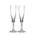 Two clear glass champagne flutes with tapered bowls and pedestal stems on square bases.