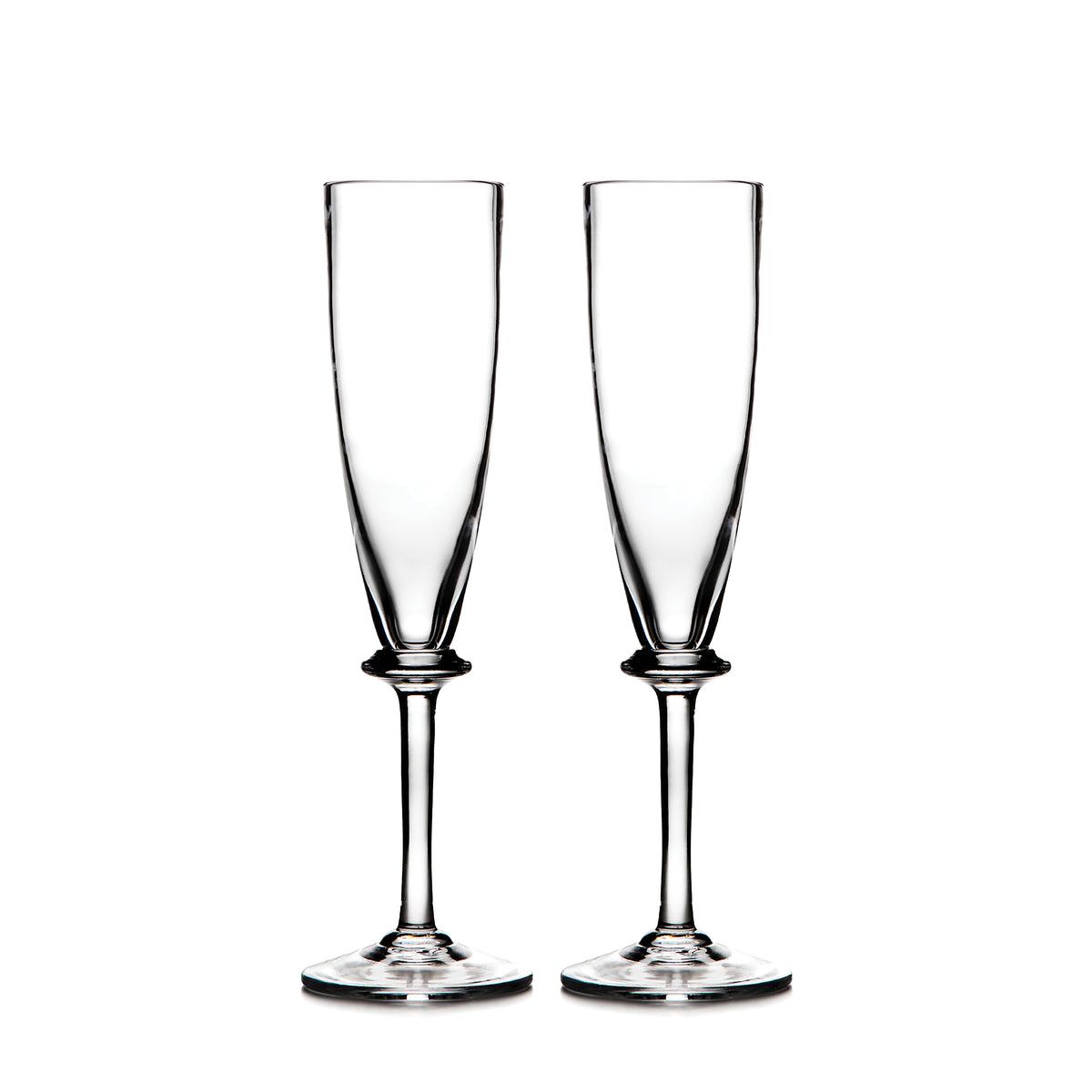 Two clear glass champagne flutes with tapered bowls and pedestal stems on square bases.