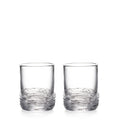 Two clear glass whiskey tumblers with textured lower sections, set side by side.