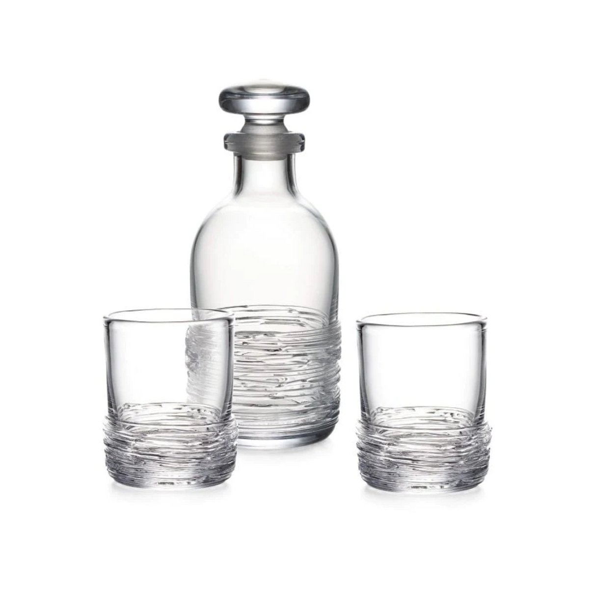 Glass whiskey decanter with stopper and two matching rocks glasses with textured bands.