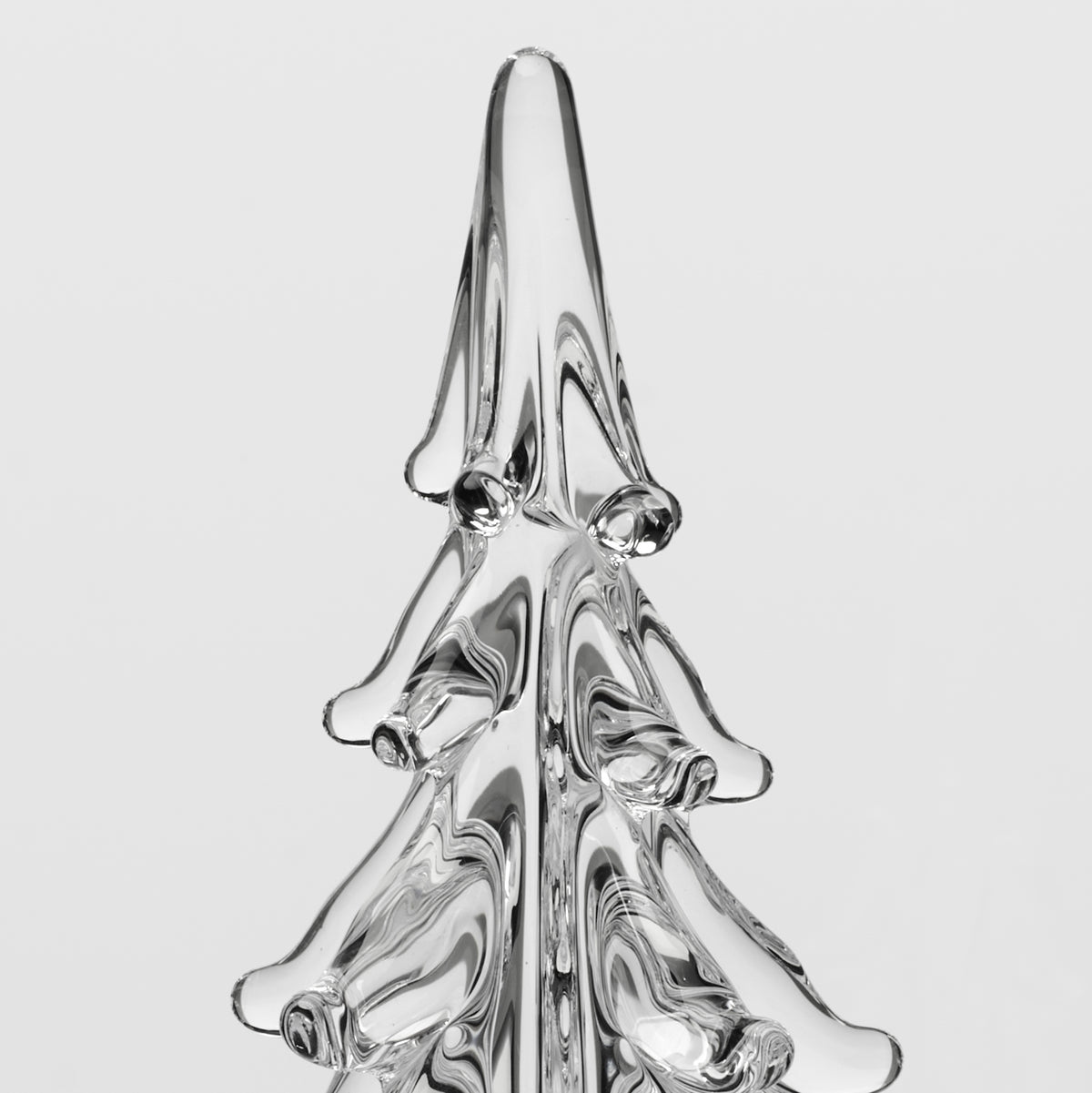 Clear glass five-sided evergreen tree with bell-shaped tiers and rounded ball finials.