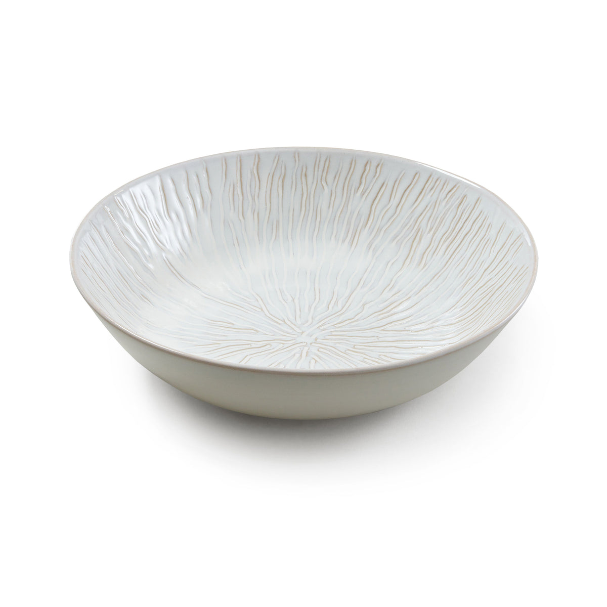 White ceramic serving bowl with radial line texture pattern throughout interior and exterior.