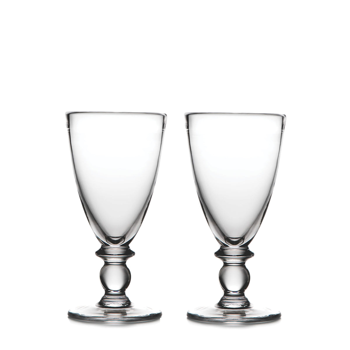 Two clear glass water glasses with decorative pedestal bases and wide bowls.